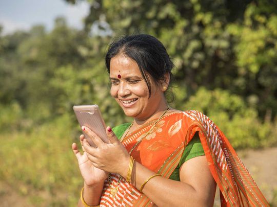 A Tough Call: Understanding barriers to and impacts of women’s mobile phone adoption in India